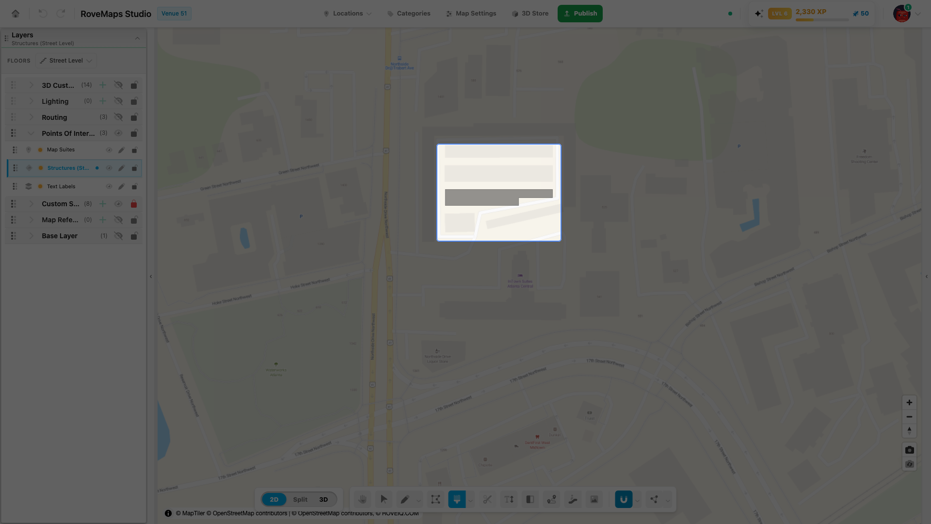 The Paint tool previewing an OpenStreetMap building under the cursor as a dark-grey wash