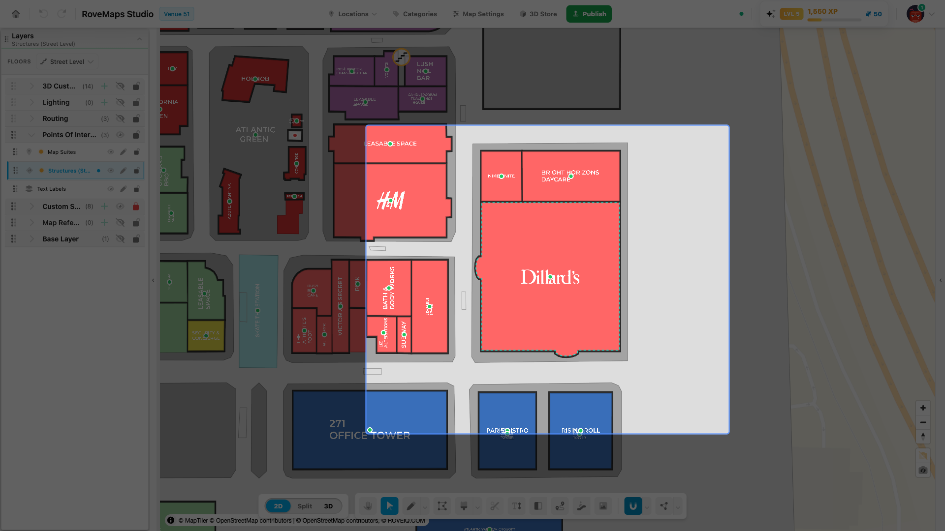 With Select (arrow), drag a box — every feature it touches on the active layer is selected.